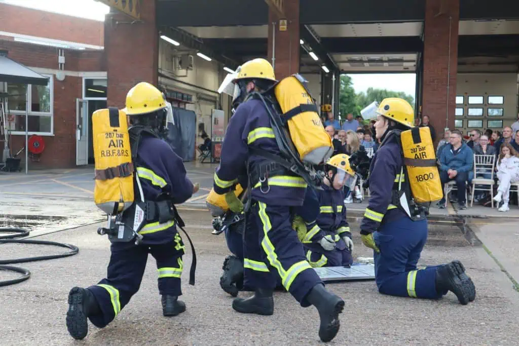 Several fire cadets huddled together