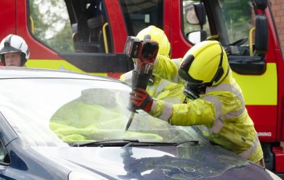 Firefighters cutting a car in a RTC demonstration.